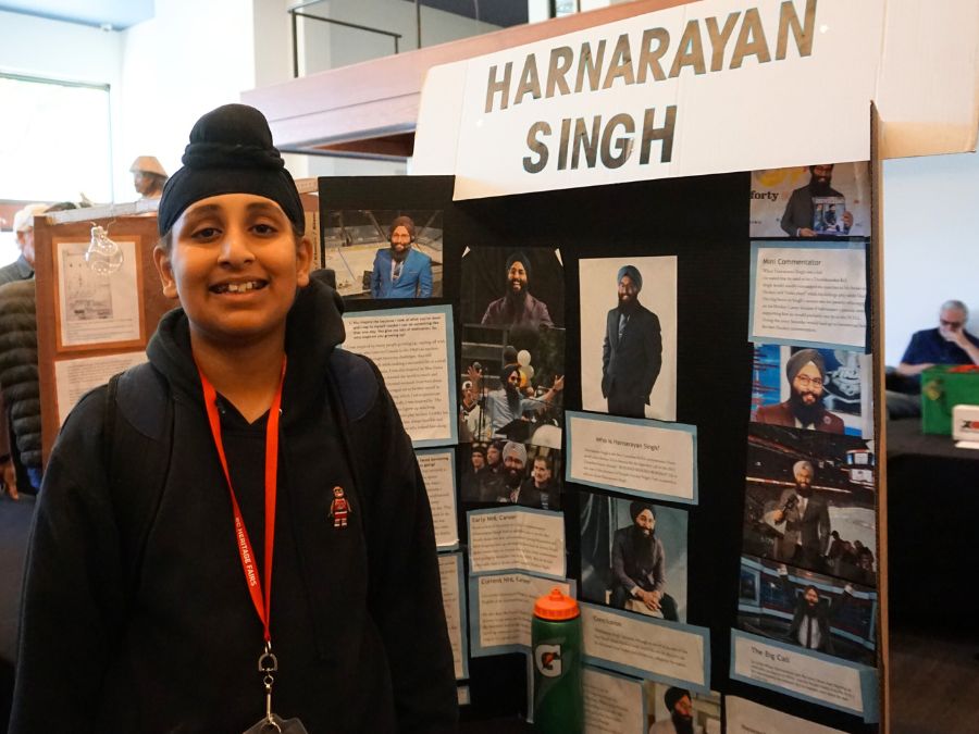 Student delegate at the 2024 Provincial Heritage Fair stands next to their project titled: Harnarayan Singh.